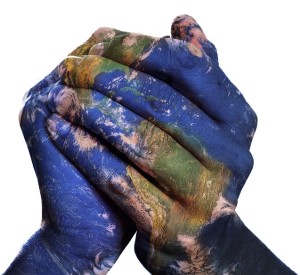 a world map in man hands forming a globe (Earth map furnished by
